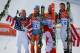 SOCHI, RUSSIA - FEBRUARY 16: (L-R) Silver medalist Andrew Weibrecht of the United States, gold medalist Kjetil Jansrud of Norway and bronze medalists Jan Hudec of Canada and Bode Miller of the United States celebrate on the podium during the flower cerem