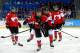 SOCHI, RUSSIA - FEBRUARY 12: Meghan Agosta-Marciano #2 of Canada celebrates after scoring a goal with Natalie Spooner #24 in the third period against the United States during the Women's Ice Hockey Preliminary Round Group A game on day five of the Sochi