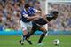 LIVERPOOL, ENGLAND - SEPTEMBER 14: John Obi Mikel of Chelsea tangles with Gareth Barry of Everton during the Barclays Premier League match between Everton and Chelsea at Goodison Park on September 14, 2013 in Liverpool, England. (Photo by Chris Brunski