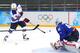SOCHI, RUSSIA - FEBRUARY 16: Phil Kessel #81 of the United States shoots against Luka Gracnar #40 of Slovenia in the third period during the Men's Ice Hockey Preliminary Round Group A game on day nine of the Sochi 2014 Winter Olympics at Shayba Arena on F