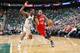 SALT LAKE CITY, UT - FEBRUARY 12: Evan Turner #12 of the Philadelphia 76ers drives against Alec Burks #10 of the Utah Jazz at EnergySolutions Arena on February 12, 2014 in Salt Lake City, Utah. NOTE TO USER: User expressly acknowledges and agrees that, b