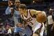 Jan 15, 2014; Milwaukee, WI, USA; Milwaukee Bucks guard Luke Ridnour (13) drives for the basket as Memphis Grizzlies guard Mike Conley (11) defends during the third quarter at BMO Harris Bradley Center. Mandatory Credit: Jeff Hanisch-USA TODAY Sports
