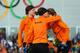 SOCHI, RUSSIA - FEBRUARY 16: (L-R) Gold medalist Jorien ter Mors of the Netherlands, silver medalist Ireen Wust of the Netherlands and bronze medalist Lotte van Beek of the Netherlands on the podium during the flower ceremony for the Speed Skating Women'