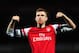 LONDON, ENGLAND - FEBRUARY 16: Per Mertesacker of Arsenal celebrates at the end of the FA Cup Fifth Round match between Arsenal and Liverpool at the Emirates Stadium on February 16, 2014 in London, England. (Photo by Shaun Botterill/Getty Images)