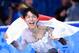 Feb 14, 2014; Sochi, RUSSIA;Yuzuru Hanyu of Japan celebrates his gold medal in men's figure skating at the Sochi 2014 Olympic Winter Games at Iceberg Skating Palace. Mandatory Credit: Robert Deutsch-USA TODAY Sports