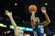 OMAHA, NE - FEBRUARY 16: James Bell #32 of the Villanova Wildcats drives to the basket over Doug McDermott #3 of the Creighton Bluejays during their game at CenturyLink Center on February 16th, 2014 in Omaha, Nebraska. (Photo by Eric Francis/Getty Images)
