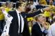 Dec 28, 2013; Ann Arbor, MI, USA; Michigan Wolverines forward Mitch McGary (4) on the bench against the Holy Cross Crusaders at Crisler Arena. Mandatory Credit: Rick Osentoski-USA TODAY Sports