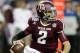 ATLANTA, GA - DECEMBER 31: Quarterback Johnny Manziel #2 of the Texas A&M Aggies rolls out and looks downfield to pass during the the Chick-fil-A Bowl game against the Duke Blue Devils at the Georgia Dome on December 31, 2013 in Atlanta, Georgia. (Photo