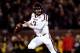 COLUMBIA, MO - NOVEMBER 30: Quarterback Johnny Manziel #2 of the Texas A&M Aggies scrambles during the game against the Missouri Tigers on November 30, 2013 in Columbia, Missouri. (Photo by Jamie Squire/Getty Images)