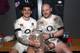 EDINBURGH, SCOTLAND - FEBRUARY 08: Jonny May (L) and Dan Cole celebrate with the Calcutta Cup after thier victory during the RBS Six Nations match between Scotland and England at Murrayfield Stadium on February 8, 2014 in Edinburgh, Scotland. (Photo by