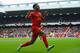 LIVERPOOL, ENGLAND - FEBRUARY 08: Raheem Sterling of Liverpool celebrates scoring the fifth goal during the Barclays Premier League match between Liverpool and Arsenal at Anfield on February 8, 2014 in Liverpool, England. (Photo by Michael Regan/Getty I