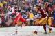 LANDOVER, MD - DECEMBER 08: Wide receiver Dwayne Bowe #82 of the Kansas City Chiefs dives into the endzone for a first quarter touchdown after catching a pass in front of David Amerson #39 and Bacarri Rambo #24 of the Washington Redskins at FedExField on