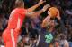 NEW ORLEANS, LA - FEBRUARY 16: The Eastern Conference's Dwyane Wade #3 of the Miami Heat takes a shot as the Western Conference's Kevin Durant #35 of the Oklahoma City Thunder defends during 2014 NBA All-Star game at the Smoothie King Center on February