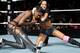 The Naomi vs. AJ Lee title match is going to have to wait.