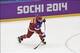Feb 16, 2014; Sochi, RUSSIA; Russia forward Alex Ovechkin (8) hits the puck in a men's preliminary round ice hockey game against Slovakia during the Sochi 2014 Olympic Winter Games at Bolshoy Ice Dome. Mandatory Credit: Scott Rovak-USA TODAY Sports