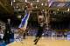 DURHAM, NC - FEBRUARY 04: Andre Dawkins #34 of the Duke Blue Devils launches a 3-point shot in front of head coach Jeff Bzdelik and Travis McKie #30 of the Wake Forest Demon Deacons during their game at Cameron Indoor Stadium on February 4, 2014 in Durha