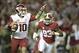 Oct 19, 2013; Tuscaloosa, AL, USA; Arkansas Razorbacks quarterback Brandon Allen (10) scrambles under pressure from Alabama Crimson Tide linebacker Jonathan Allen (93) during the first quarter at Bryant-Denny Stadium. Mandatory Credit: John David Mercer-U