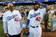 LOS ANGELES, CA - APRIL 15: Matt Kemp #27 of the Los Angeles Dodgers (R, wearing #42) laughs with Don Newcombe, former Brooklyn Dodgers teammate of Jackie Robinson, before the game with the St. Louis Cardinals as Major League Baseball celebrates Jackie R
