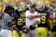 ANN ARBOR, MI - SEPTEMBER 12: Michigan head coach Rich Rodriguez disputes a call with and official against Notre Dame at Michigan Stadium on September 12, 2009 in Ann Arbor, Michigan. (Photo by Domenic Centofanti/Getty Images)