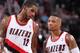 PORTLAND, OR - JANUARY 28: LaMarcus Aldridge #12 and Damian Lillard #0 of the Portland Trail Blazers talk against the Memphis Grizzlies on January 28, 2014 at the Moda Center Arena in Portland, Oregon. NOTE TO USER: User expressly acknowledges and agrees