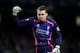 MANCHESTER, ENGLAND - DECEMBER 26: Simon Mignolet, Goalkeeper of Liverpool celebrates the opening goal by team mate Philippe Coutinho during the Barclays Premier League match between Manchester City and Liverpool at the Etihad Stadium on December 26, 201