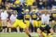 October 20, 2012; Ann Arbor, MI, USA; Michigan Wolverines kicker Brendan Gibbons (34) attempts a field goal during the second half against the Michigan State Spartans at Michigan Stadium. Michigan won 12-10. Mandatory Credit: Mike Carter-USA TODAY Sports