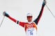 SOCHI, RUSSIA - FEBRUARY 18: Joergen Graabak of Norway celebrates as he wins the gold medal in the Nordic Combined Men's 10km Cross Country during day 11 of the Sochi 2014 Winter Olympics at RusSki Gorki Nordic Combined Skiing Stadium on February 18, 201