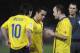 ALMERIA, SPAIN - MARCH 06: Lionel Messi, Xavi Hernandez and Andres Iniesta (R) of Barcelona talk before Messi scored from a free kick during the La Liga match between UD Almeria and Barcelona at Estadio del Mediterraneo on March 6, 2010 in Almeria, Spain