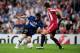 MADRID, SPAIN - MAY 22: Diego Milito of Inter Milan beats Daniel van Buyten of Bayern Munich to score their second goal during the UEFA Champions League Final match between FC Bayern Muenchen and Inter Milan at the Estadio Santiago Bernabeu on May 22, 20