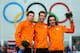 SOCHI, RUSSIA - FEBRUARY 18: (L-R) Silver medalist Sven Kramer of the Netherlands, gold medalist Jorrit Bergsma of the Netherlands and bronze medalist Bob de Jong of the Netherlands celebrate during the flower ceremony for the Men's 10000m Speed Skating e