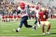 Dec 31, 2013; Shreveport, LA, USA; Arizona Wildcats running back Ka'Deem Carey (25) carries the ball into the end zone for a touchdown in front of Boston College Eagles defensive back Dominique Williams (9) in the third quarter at Independence Stadium. Ar