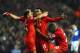 LIVERPOOL, ENGLAND - JANUARY 28: Daniel Sturridge (C) of Liverpool is congratulated by teammates Luis Suarez (2nd L), Raheem Sterling (L) and after scoring his team's third goal Aly Cissokho during the Barclays Premier League match between Liverpool and
