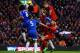 LIVERPOOL, ENGLAND - JANUARY 01: Daniel Agger of Liverpool heads in their first goal past Tom Huddlestone of Hull City during the Barclays Premier League match between Liverpool and Hull City at Anfield on January 1, 2014 in Liverpool, England. (Photo b