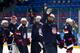 SOCHI, RUSSIA - FEBRUARY 17: Megan Bozek #9 of the United States waves to the crowd with teammates after defeating Sweden 6-1 during the Women's Ice Hockey Playoffs Semifinal game on day ten of the Sochi 2014 Winter Olympics at Shayba Arena on February 17