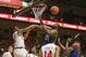 Feb 18, 2014; Lubbock, TX, USA; Kansas Jayhawks center Joel Embiid (21) is fouled by Texas Tech Red Raiders forward Jordan Tolbert (32) in the first half at United Spirit Arena. Mandatory Credit: Michael C. Johnson-USA TODAY Sports