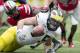 November 24, 2012; Columbus, OH, USA; Michigan Wolverines offensive linesman Michael Schofield (75) tries to recover a loose football against the Ohio State Buckeyes at Ohio Stadium. Ohio State won the game 26-21. Mandatory Credit: Greg Bartram-USA TODAY
