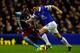 LIVERPOOL, ENGLAND - FEBRUARY 01: Gareth Barry (R) of Everton in action with Christian Benteke of Aston Villa during the Barclays Premier League match between Everton and Aston Villa at Goodison Park on February 1, 2014 in Liverpool, England. (Photo by Pa