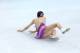 SOCHI, RUSSIA - FEBRUARY 08: Mao Asada of Japan falls while competing in the Figure Skating Team Ladies Short Program during day one of the Sochi 2014 Winter Olympics at Iceberg Skating Palace on February 8, 2014 in Sochi, Russia. (Photo by Matthew Stoc