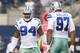 Sep 22, 2013; Arlington, TX, USA; Dallas Cowboys defensive end DeMarcus Ware (94) celebrates a sack with defensive tackle Jason Hatcher (97) against the St. Louis Rams in the first quarter of the game at AT&T Stadium. Mandatory Credit: Tim Heitman-USA TO
