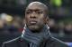 MILAN, ITALY - FEBRUARY 19: AC Milan coach Clarence Seedorf looks on before the UEFA Champions League Round of 16 match between AC Milan and Club Atletico de Madrid at Stadio Giuseppe Meazza on February 19, 2014 in Milan, Italy. (Photo by Marco Luzzani/