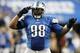 Dec 22, 2013; Detroit, MI, USA; Detroit Lions defensive tackle Nick Fairley (98) celebrates after making a play during the fourth quarter against the New York Giants at Ford Field. Giants beat the Lions 23-20. Mandatory Credit: Raj Mehta-USA TODAY Sports