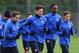 ST ALBANS, ENGLAND - FEBRUARY 18: Olivier Giroud and Mathieu Flamini warm up during a training session at London Colney on February 18, 2014 in St Albans, England. (Photo by Shaun Botterill/Getty Images)