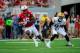 LINCOLN, NE - SEPTEMBER 7: Cornerback Stanley Jean-Baptiste #16 of the Nebraska Cornhuskers intercepts a pass in front of wide receiver Rickey Bradley #81 of the Southern Miss Golden Eagles during their game at Memorial Stadium on September 7, 2013 in Lin