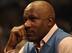 CHICAGO, IL - APRIL 13: Former player Ron Harper watches as the Chicago Bulls take on the New Jersey Nets at the United Center on April 13, 2011 in Chicago, Illinois. The Bulls defeated the Nets 97-92. NOTE TO USER: User expressly acknowledges and agrees
