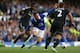 LIVERPOOL, ENGLAND - SEPTEMBER 14: Ross Barkley of Everton competes with John Obi Mikel of Chelsea during the Barclays Premier League match between Everton and Chelsea at Goodison Park on September 14, 2013 in Liverpool, England. (Photo by Clive Brunski