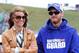 KANSAS CITY, KS - APRIL 21: Dale Earnhardt Jr., driver of the #88 National Guard Chevrolet, and girlfriend Amy Reimann stand on the grid during pre-race ceremonies for the NASCAR Sprint Cup Series STP 400 at Kansas Speedway on April 21, 2013 in Kansas Ci