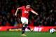 MANCHESTER, ENGLAND - JANUARY 22: Rafael Da Silva of Manchester United misses with his penalty attempt during the Capital One Cup semi final, second leg match between Manchester United and Sunderland at Old Trafford on January 22, 2014 in Manchester, Eng