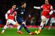 LONDON, ENGLAND - FEBRUARY 12: Juan Mata of Manchester United and Tomas Rosicky of Arsenal challenge for the ball during the Barclays Premier League match between Arsenal and Manchester United at the Emirates Stadium on February 12, 2014 in London, Engla