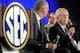 SEC commissioner Mike Slive (right)