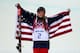 SOCHI, RUSSIA - FEBRUARY 20: Gold medalist Maddie Bowman of the United States celebrates during the flower ceremony in the Freestyle Skiing Ladies' Ski Halfpipe Finals on day thirteen of the 2014 Winter Olympics at Rosa Khutor Extreme Park on February 20